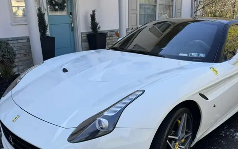 A white Ferrari California, clean and glossy after a detail